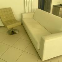 Poltrona girevole beige