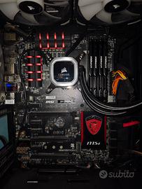 Scheda madre + CPU + RAM + dissipatore + PSU