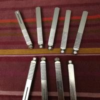 Perni quadri a espansione per maniglia porta