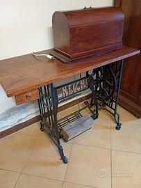 macchina da cucire / ritiro a mano 