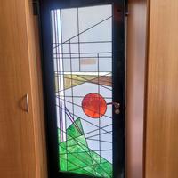 porta con inserto in vetro piombato