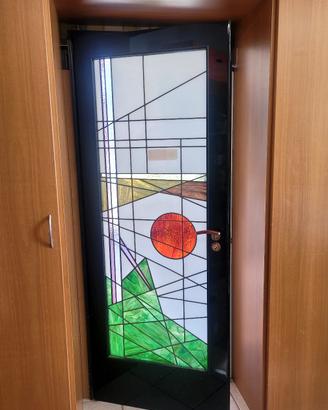 porta con inserto in vetro piombato