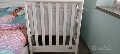 Lettino Pali con sponda abbassabile