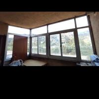 Chiusura veranda angolare alluminio