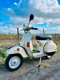 Vespa P150X Targa oro ASI
