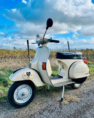 Vespa P150X Targa oro ASI
