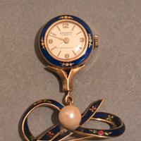 Spilla con orologio vintage in Oro 750 (18 kt)