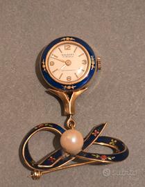 Spilla con orologio vintage in Oro 750 (18 kt)