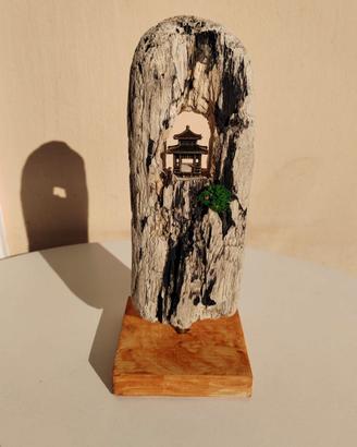 Tempio orientale su legno di mare riproduzione