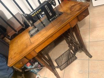 Poltrone, macchina ds cucire, manichino