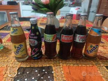 bottiglie di coca- cola e fanta