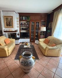 Parete attrezzata soggiorno legno e vetro