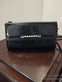 pochette vintage in pelle 