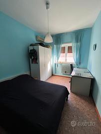 Posto letto in camera singola arredata