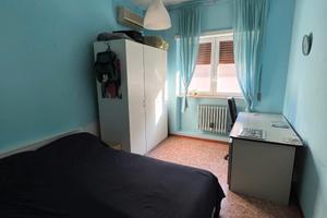 Posto letto in camera singola arredata