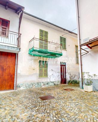 CASA CON GIARDINO PRIVATO IN POSIZIONE TRANQUILLA!