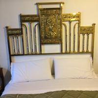 Letto matrimoniale in ottone.