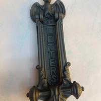 Batti portone in ghisa