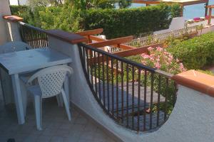 Santa litterata, sulla spiaggia