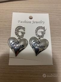 orecchini imitazione guess in acciaio