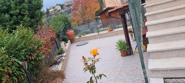 Appartamento con giardino e garage