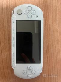 PSP E1004 con 4 giochi