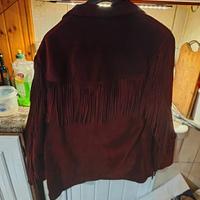 giacca. frangiata in camoscio marrone 