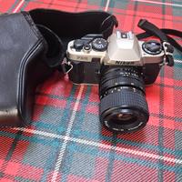 NIKON FE10 REFLEX con 35-70mm vintage con custodia