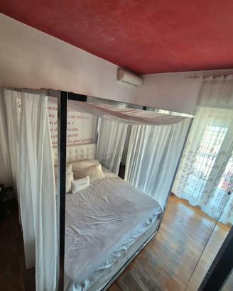 Letto a baldacchino