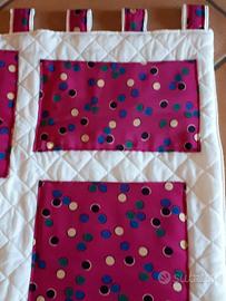 Pannello con tasche portaoggetti