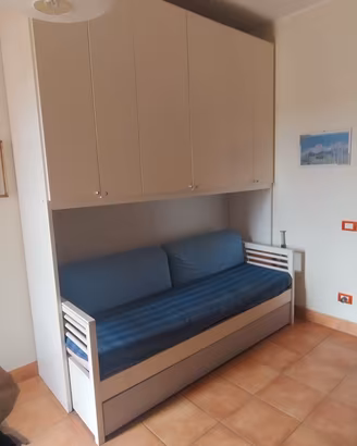 armadio a ponte con letto