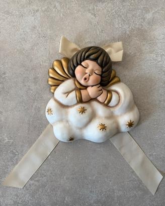Thun Formella Angelo Capoletto che dorme su nuvola