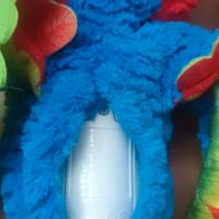 peluche animatronic pappagallo