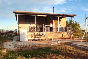 Terreno con casa