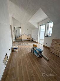 Appart. mansardato con terrazzo in Via M.D.Grazie