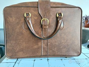 valigia marrone vintage