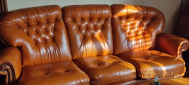 Divano in pelle con due poltrone
