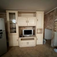 credenza ed ellitica