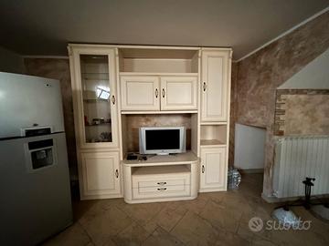 credenza ed ellitica