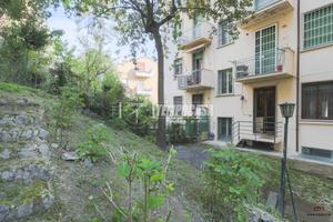 APPARTAMENTO CON GIARDINO PRIVATO, GARAGE E CANTIN