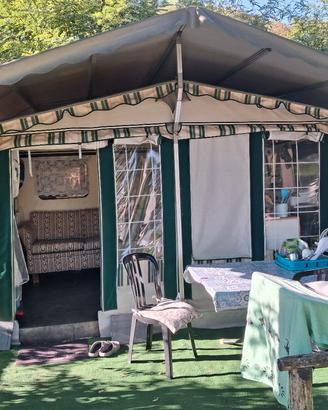 Roulotte con tenda stanziale
