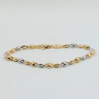 Bracciale oro bianco e giallo 18 kt di gr. 6.05