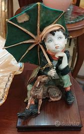 Scultura Ragazzo con l'ombrello G.Armani