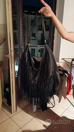 Borsa in pelle con frange marca Del Conte