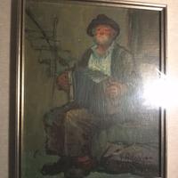 vecchio contadino seduto su scala con fisarmonica
