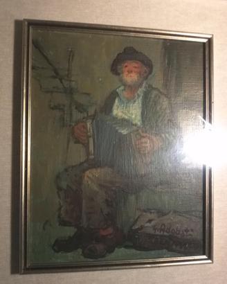 vecchio contadino seduto su scala con fisarmonica