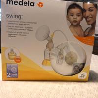 tiralatte medela