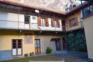 Vendita - appartamento con giardino in montagna