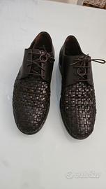 scarpe moda traforate stilista Calvin klein