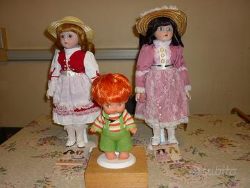 Bambolotto Furga + bambole porcellana Heritage